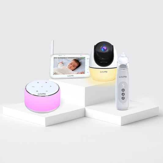 Luumii babymonitor med skjerm og nattlys, elektrisk nesesuger og white noise-maskin presentert som et samlet produktsett