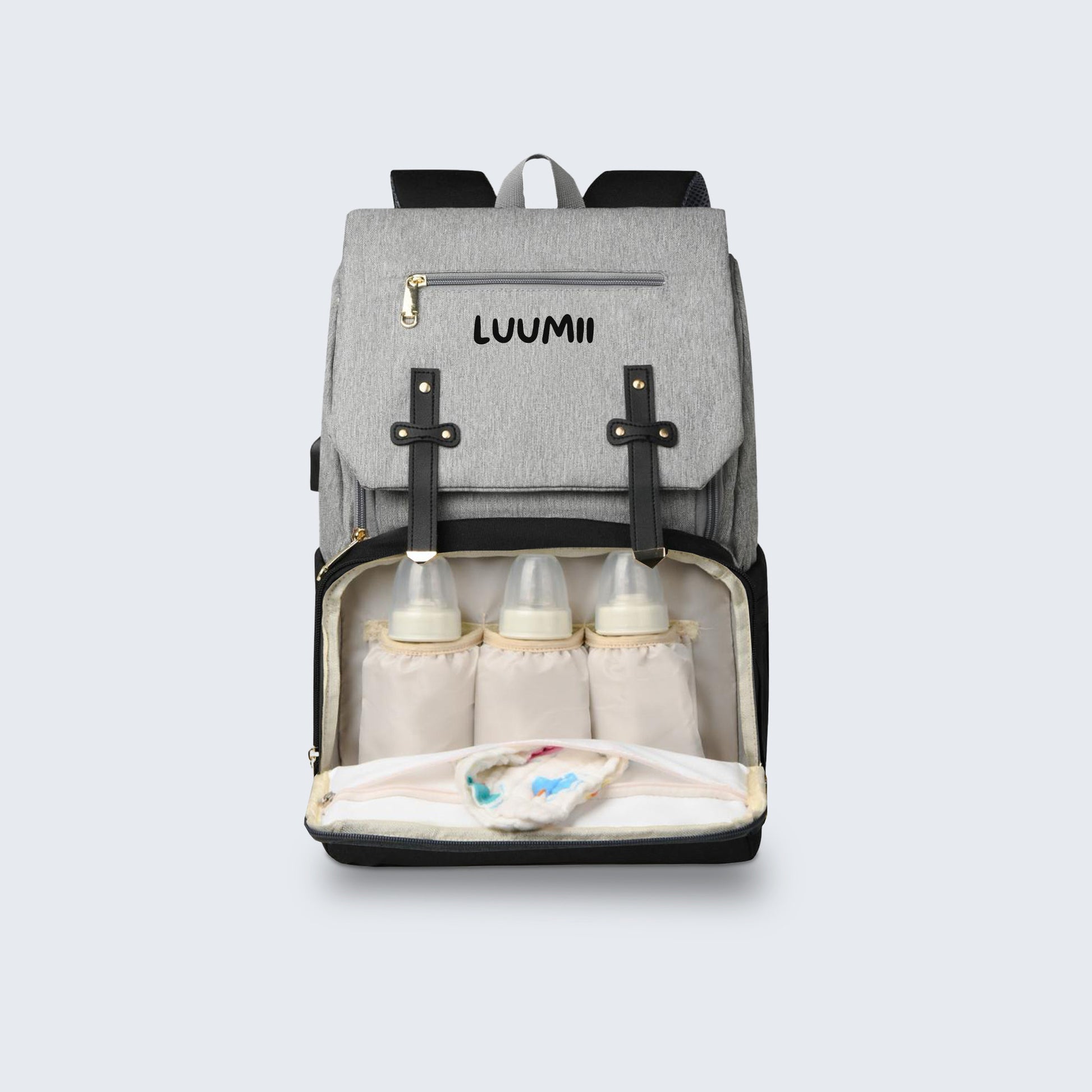 Luumii stelleveske med åpnet termorom og tre tåteflasker